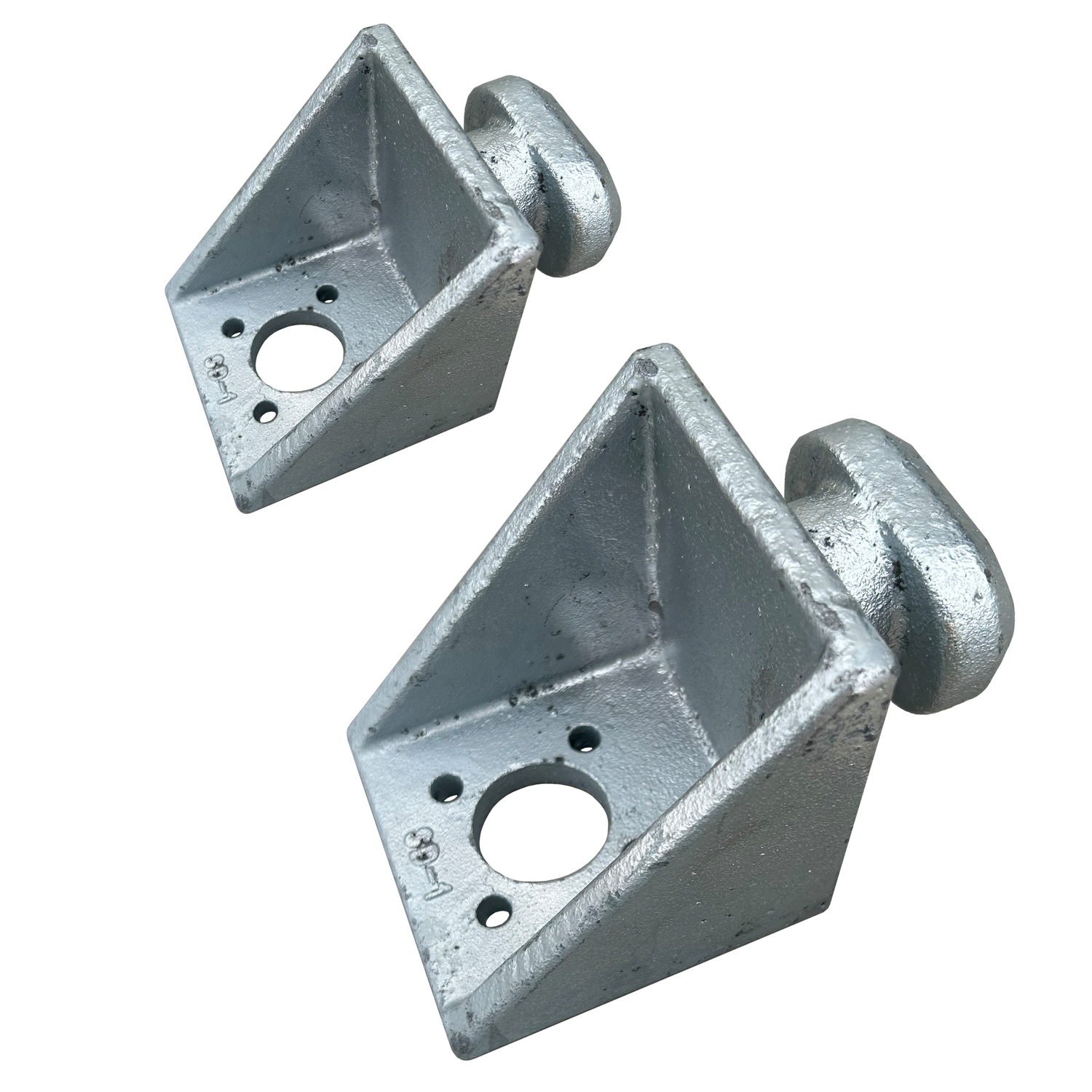 Pair of galvanized steel Quick Attach Tie Downs designed to fit ISO 1161 corner castings, used for anchoring shipping containers to concrete, rock, or metal surfaces.