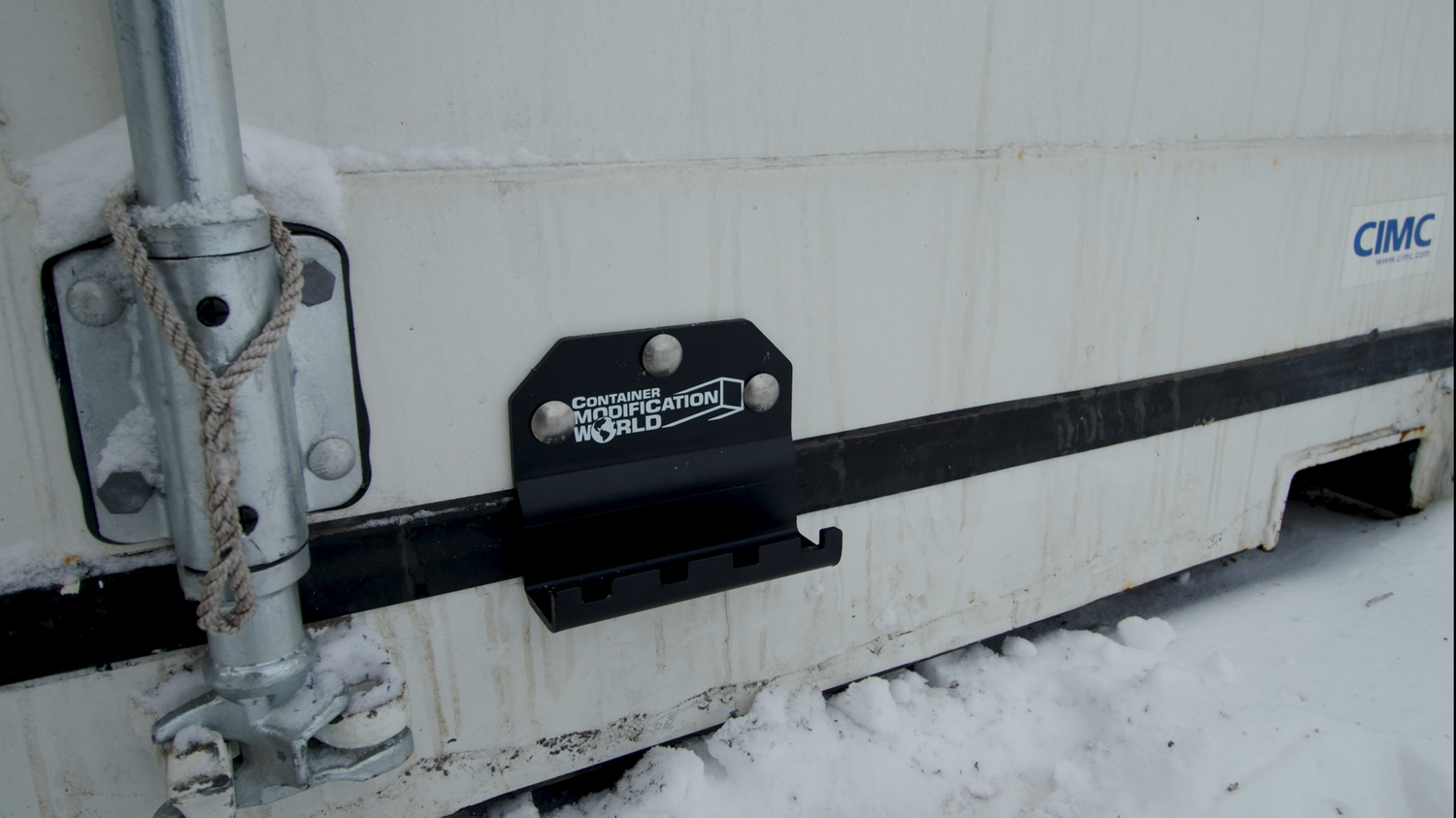 Kick 'N' close kick plate installed to protect door seals