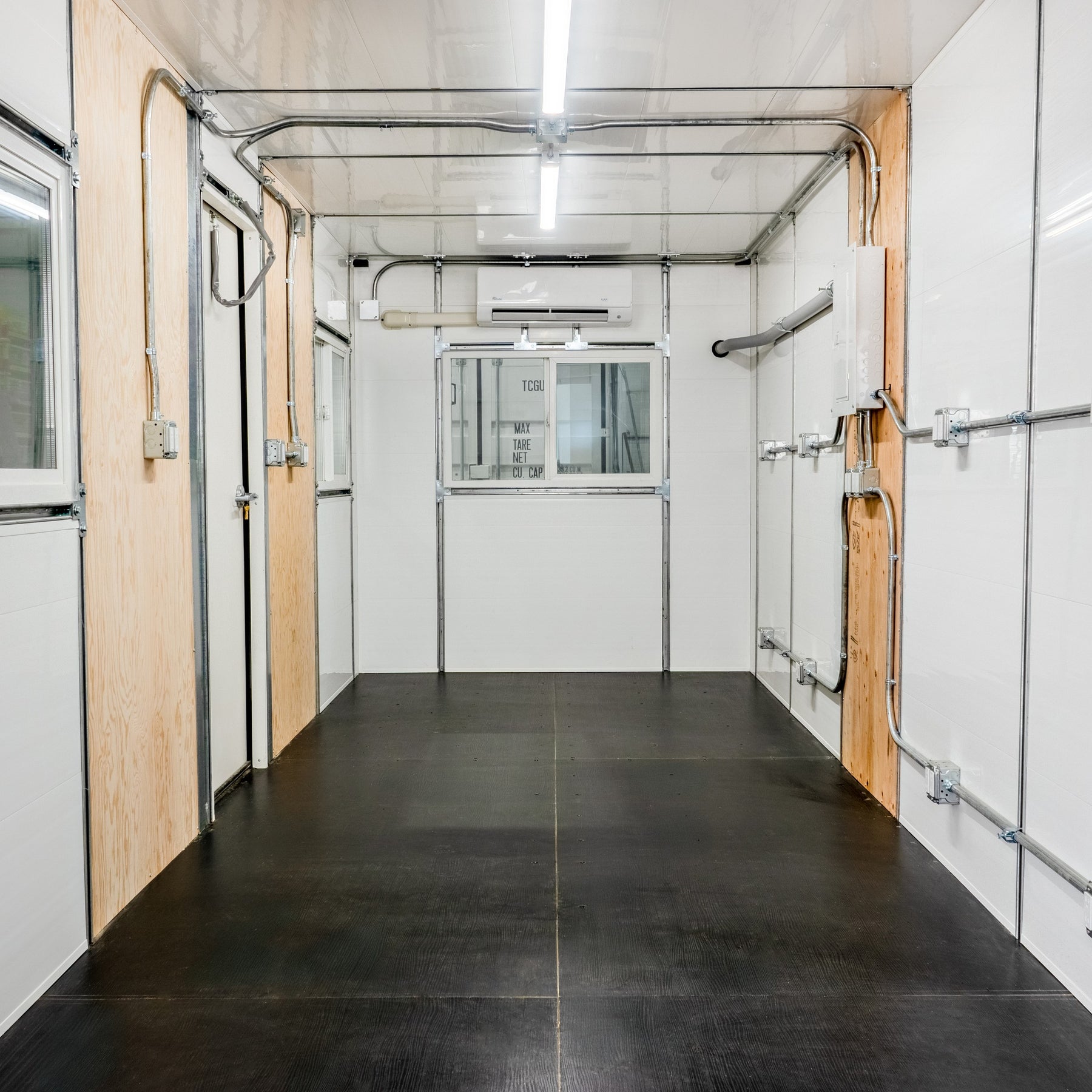20 foot GLO ground level office site shack finished interior open workspace