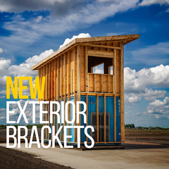 Two-story shipping container building framed with wood using new exterior brackets